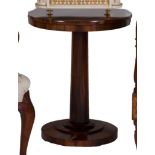 A VICTORIAN CIRCULAR ROSEWOOD OCCASIONAL