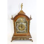 A LATE 19TH CENTURY FINE QUALITY WINTERHALDER & HOFFMEIR GILT BRASS MOUNTED OAK BRACKET CLOCK, the