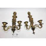 A PAIR OF LATE 19TH CENTURY FRENCH CAST-BRASS CARYATID FORM WALL SCONCES with twin branch candle-