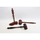 A 19TH CENTURY ROSEWOOD GAVEL with turned foliate ended handle, 9 1/4 ins long another Rosewood