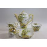 A 1920/30'S SHELLEY PORCELAIN FIFTEEN PIECE COFFEE SERVICE decorated in the "Daffodil Time" pattern,