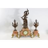 A LATE 19TH CENTURY FRENCH VARIEGATED ROUGE MARBLE CLOCK GARNITURE, the clock with central bronzed