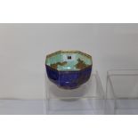 A 1920/30'S WEDGWOOD PORCELAIN HEXAGONAL BOWL, blue ground exterior with gilt dragons and green