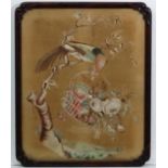 A mid 19 thC ,
Water colour on silk,
A pheasant on a perch reaching into a basket of fruit and