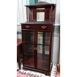 Display case with mirror back top CONDITION: Please Note -  we do not make reference to the