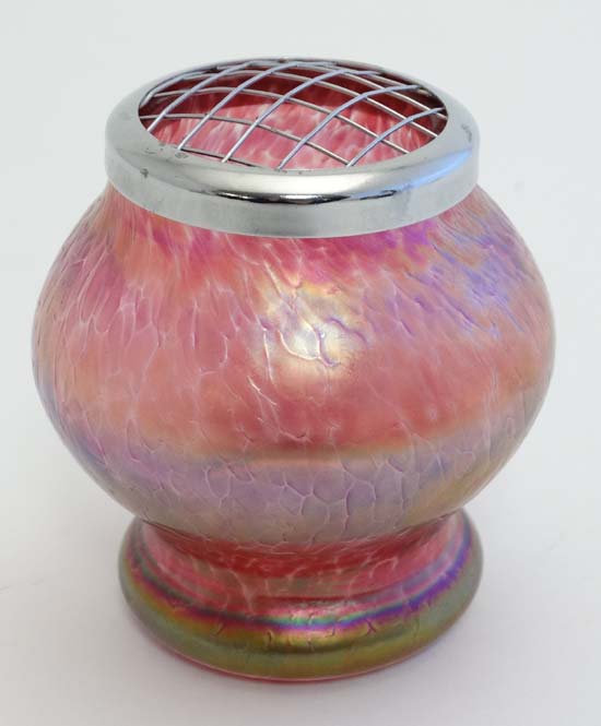 Loetz / Davidson style vase : a pink iridescent bellied small vase with chromed net cover,