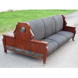 A 19thC upholstered mahogany double sided confidante sofa . 102 3/4'' long x 57'' wide x 39'' high.