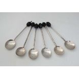 A matched set of 6 silver coffee spoons with bean decoration to handles CONDITION: