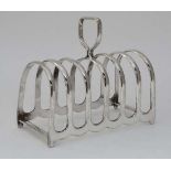 A 6 section plated toast rack CONDITION: Please Note - we do not make reference to