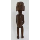 Ethnographica : A native African tribal carved wooden figure standing 11" high