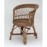 A childs wicker chair CONDITION: Please Note - we do not make reference to the