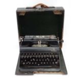 Olympia cased typewriter CONDITION: Please Note - we do not make reference to the