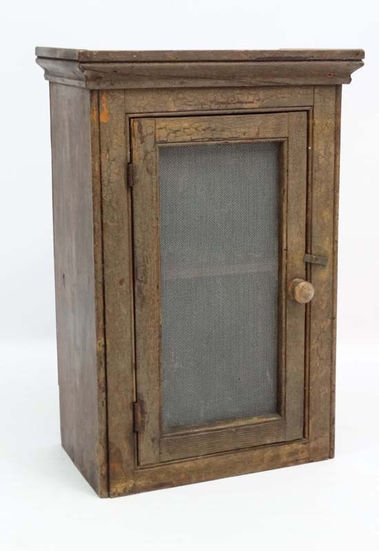 A Victorian scumbled pine cheese safe wall mounted with grill to front.