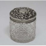 A cut glass toilet jar with silver plated top CONDITION: Please Note - we do not