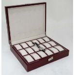 Watch in large display box ( to fit 18 watches) CONDITION: Please Note - we do not