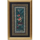 Chinese Silkwork : a framed sleeve with butterfly over peony within an applied border all in worked