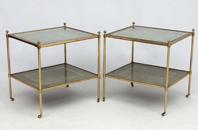 Mid Century / Hollywood Regency : A pair of gilt brass two tiered lamp tables with further gilt on