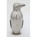 Novelty Cocktail Shaker : an American Silver plate cocktail shaker in the form of a penguin wearing