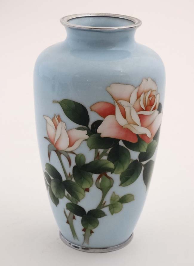 An early 20thC Japanese Cloisonne baluster shaped vase with rose decoration .