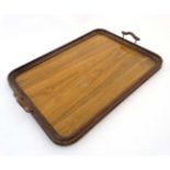 An early 20thC walnut twin handled tray 22 3/4" x 16 3/4" CONDITION: Please Note -