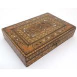 An Eastern box with hinged lid and mosaic and cross banded inlay with mother of pearl detail.