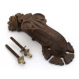 Arts & Crafts manner of Kenrick : A cast iron door knocker. marked verso no.