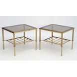 Mid Century / Hollywood Regency : a pair of Manner Of Maison Jansen Lamp tables with glass tops and