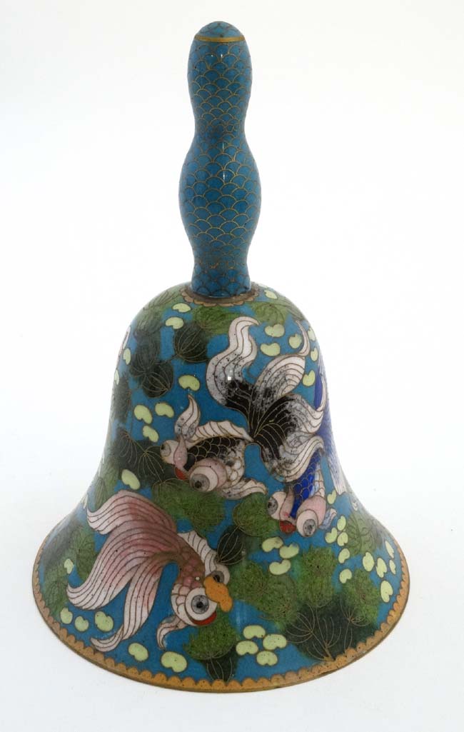 An Oriental Cloisonne table bell decorated with 6 carp 7 1/4" high CONDITION: