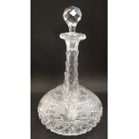 A cut glass/ crystal decanter and stopper, the body with etched fruiting vine decoration.
