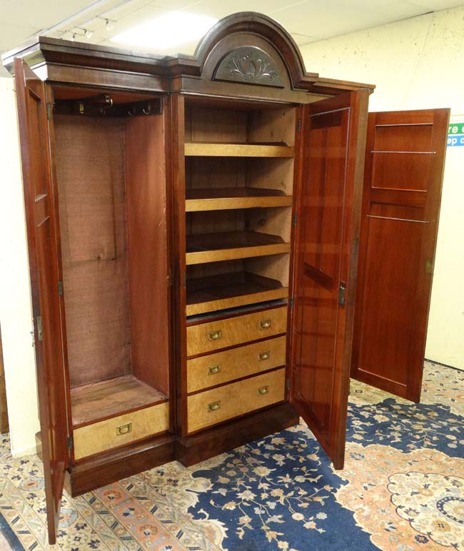 A 19thC mahogany breakfront triple wardrobe with central section with drawers and linen sides 94" - Image 3 of 4