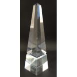 A glass obelisk approx 10" high CONDITION: Please Note - we do not make reference