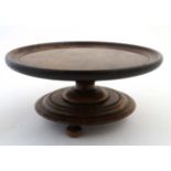 A late 19thC mahogany Lazy Susan of circular form on triform base 13" CONDITION: