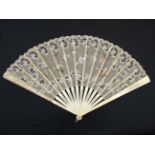 A 19thC 17 stick bone fan with hand painted floral decoration 30 3/4" long CONDITION: