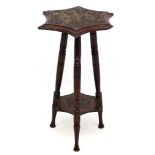 A 19thC 3 legged 2-tier occasional table with carved top approx 26 1/2" high x 16 1/2" diameter