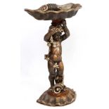 A mid - late 20thC Italian gilded figure of a cherub / putto with fruiting vines and holding a