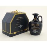 Venice Simplon Orient - Express cased a ceramic Scotch Whiskey flask in a folding case marked '