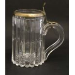 An early - mid 20thC glass tankard with silver plated mounted and hinged glass lid.