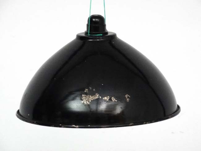 Vintage Industrial : a semi Dome black painted metal light shade with white enamel under.