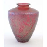 A Royal Brierley Studio vase the cranberry coloured glass with iridescent finish. Signed under .