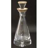 A glass decanter and stopper of conical form with silver mounts hallmarked Birmingham 2009 maker