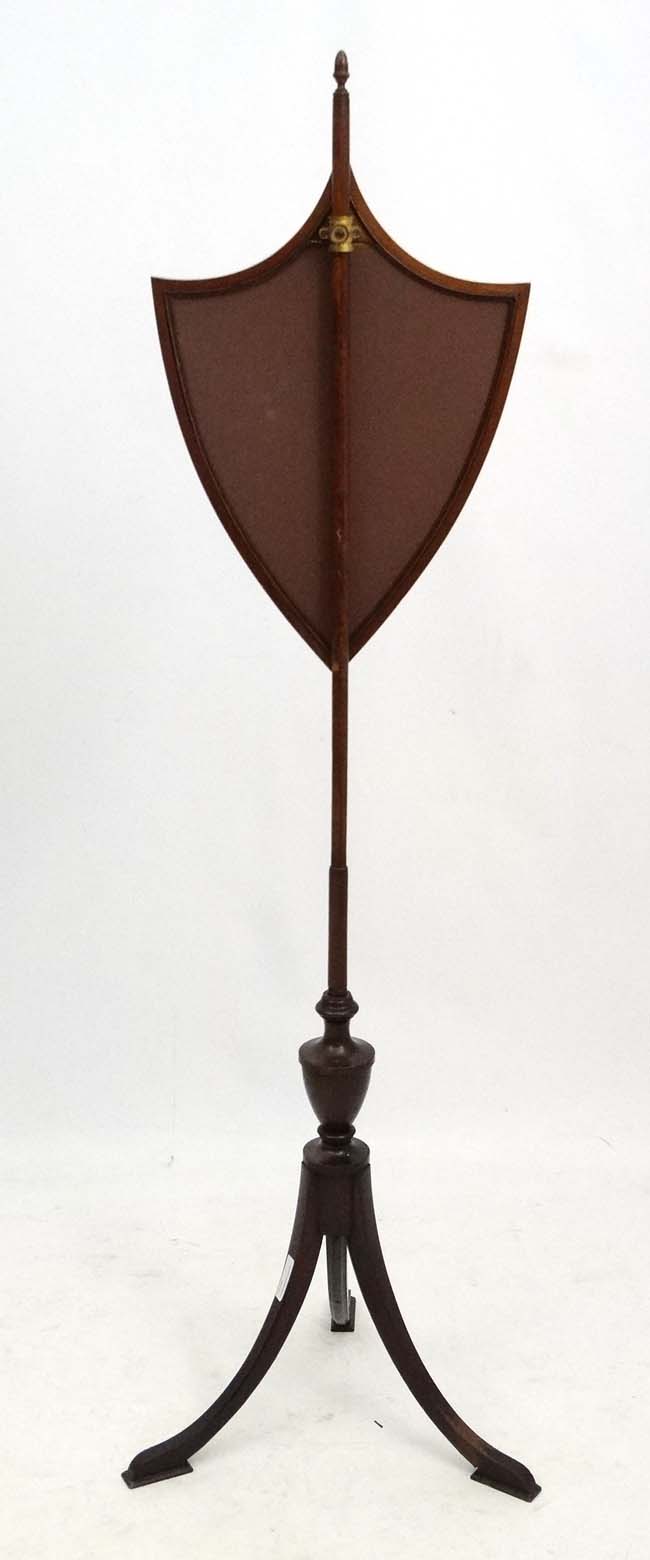 An 18thC mahogany tripod pole screen with shield shape screen 62" high CONDITION: - Image 2 of 4