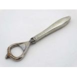Bottle Opener : a useful nickel plated early 20 thC bottle opener with foil hook,