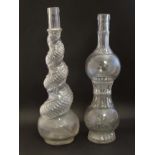 2 early - mid 20thC moulded glass bottles, one of double gourd form,