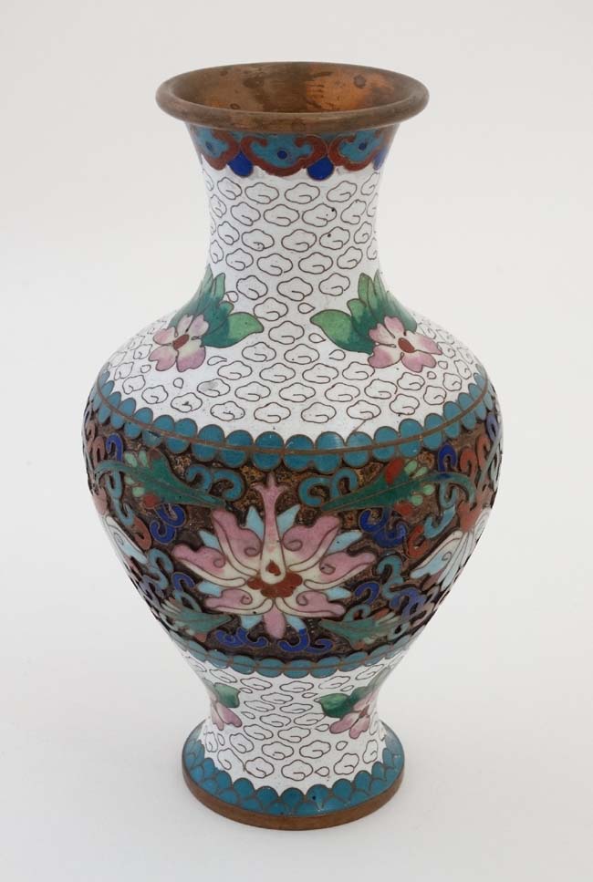 A late 20thC cloisonne baluster shaped vase standing 6 3/4" high CONDITION: Please