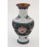 A late 20thC cloisonne baluster shaped vase standing 6 3/4" high CONDITION: Please