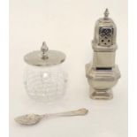 A silver plated sugar caster / shaker together with a cut glass and silver plate preserve pot.