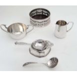 A Sheffield plate bottle coaster, a silver plated cream jug and basin of plain design ,