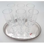 An oval silver plated gallery tray and a set of 6 champagne fluted glasses CONDITION: