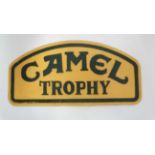 A 21stC painted cast metal "Camel Trophy" sign 15 1/2" wide CONDITION: Please Note