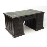 A Victorian bog oak wide pedestal desk 60" wide x 40" deep x 29 3/4" high CONDITION: